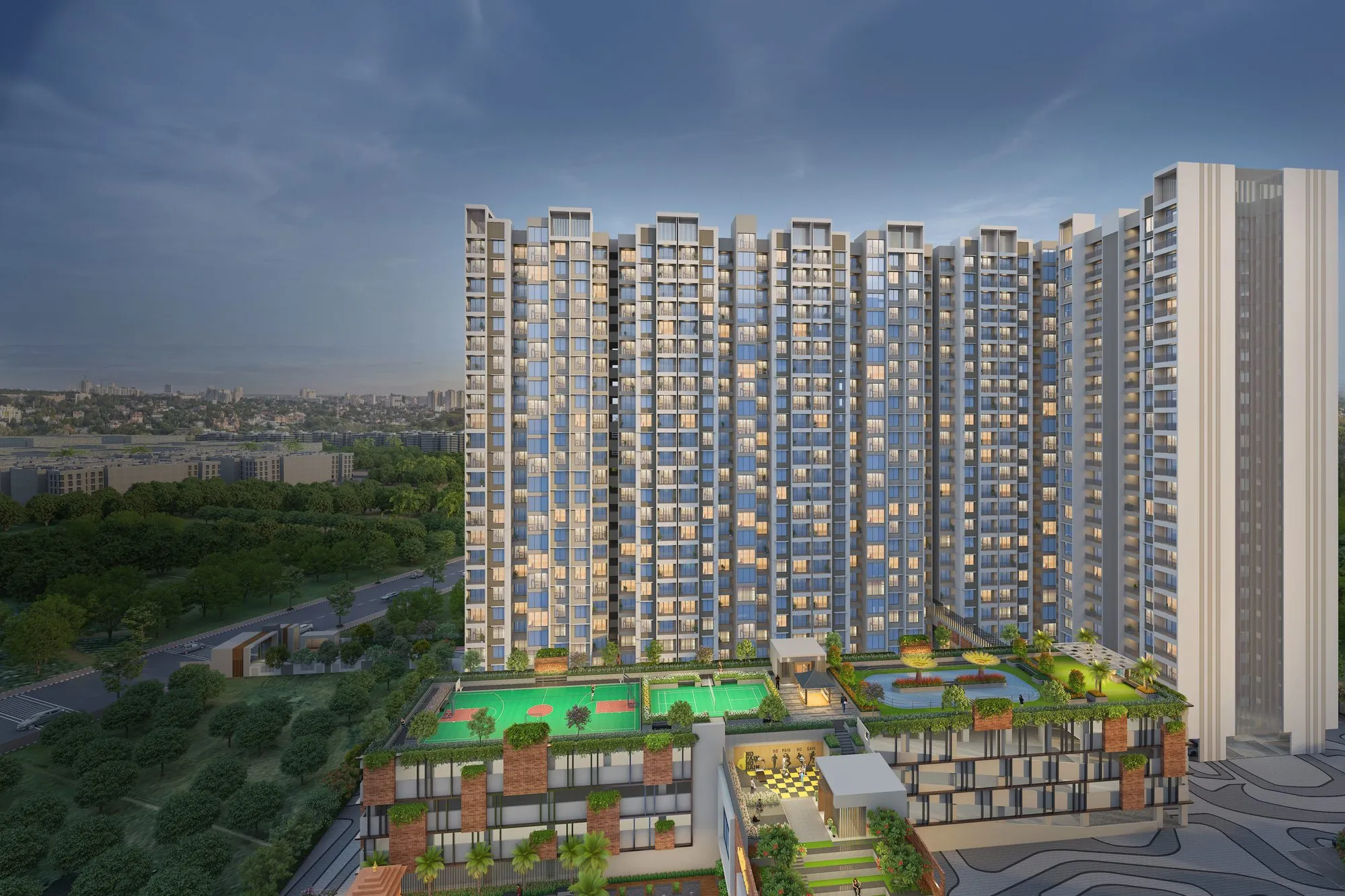 Legacy Milestone twilight exterior view with pool deck and high-rise towers